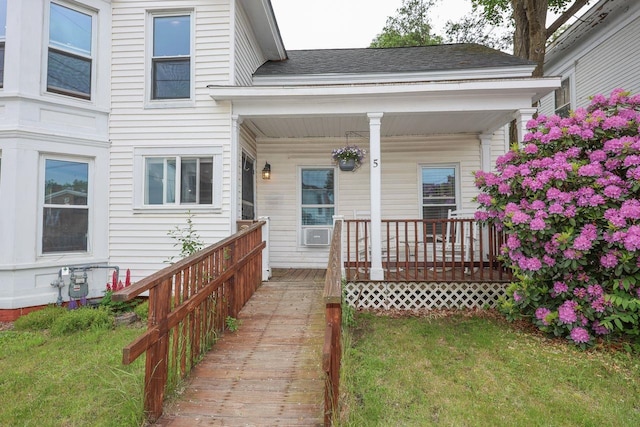 5 School St, Tilton, NH 03276 - entrance to property with a porch, a yard, and a shingled roof