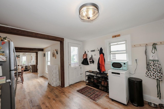 5 School St, Tilton, NH 03276 - mudroom with light wood finished floors and healthy amount of natural light