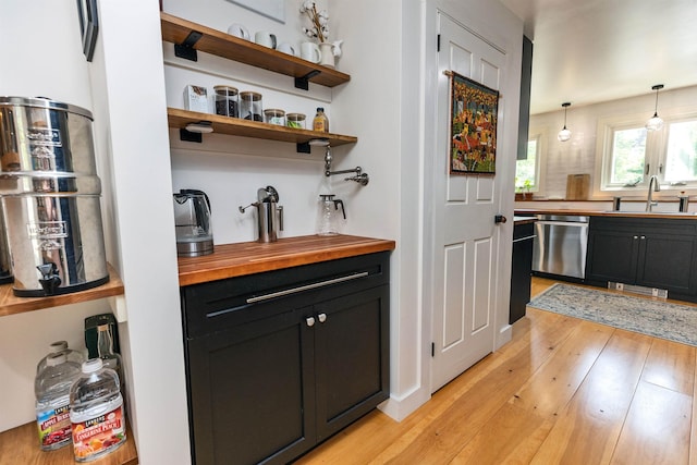 121 Main St, New Ipswich, NH 03071 - indoor wet bar with dishwasher, light wood-style flooring, and pendant lighting