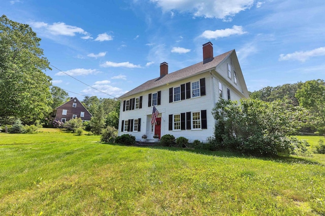 121 Main St, New Ipswich, NH 03071 - colonial-style house with a chimney and a front lawn