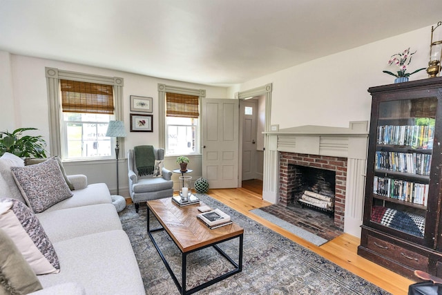 121 Main St, New Ipswich, NH 03071 - living room featuring wood finished floors and a fireplace