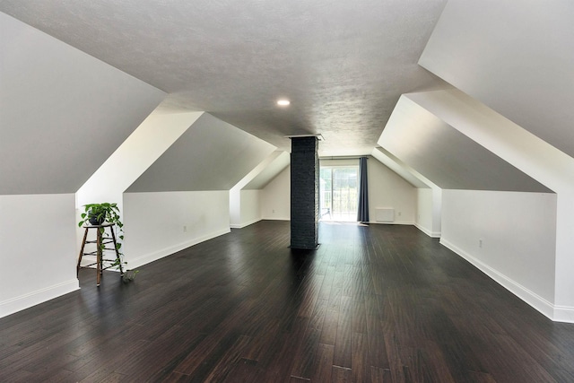 121 Main St, New Ipswich, NH 03071 - additional living space featuring dark wood-type flooring and vaulted ceiling