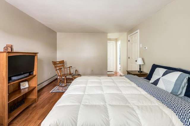 1 Constable Rd, Durham, NH 03824 - bedroom with baseboard heating and wood finished floors