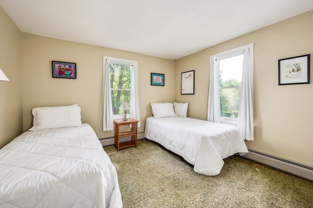 1 Constable Rd, Durham, NH 03824 - carpeted bedroom with a baseboard radiator