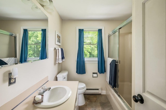 1 Constable Rd, Durham, NH 03824 - bathroom featuring a baseboard radiator, plenty of natural light, vanity, and enclosed tub / shower combo