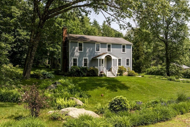 1 Constable Rd, Durham, NH 03824 - colonial home featuring a chimney and a front yard
