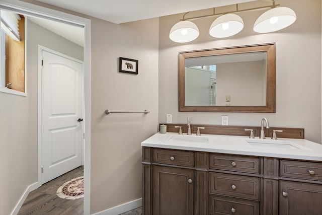 149 Club Sugarbush N Rd, Warren, VT 05674 - full bath featuring double vanity and wood finished floors