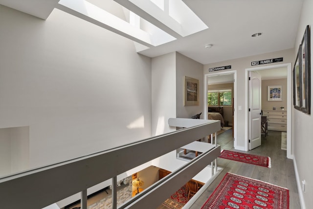 149 Club Sugarbush N Rd, Warren, VT 05674 - hall featuring a skylight and wood finished floors