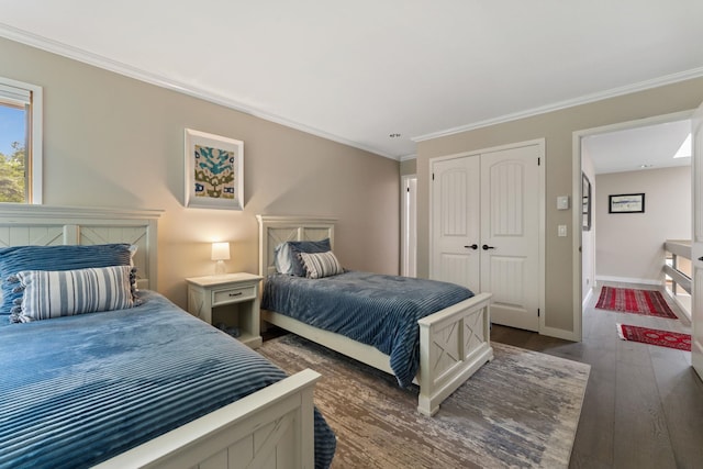 149 Club Sugarbush N Rd, Warren, VT 05674 - bedroom with dark wood finished floors, ornamental molding, and a closet