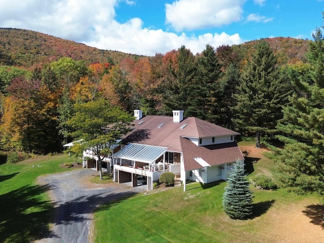 149 Club Sugarbush N Rd, Warren, VT 05674 - view from above of property with a heavily wooded area and a mountain backdrop