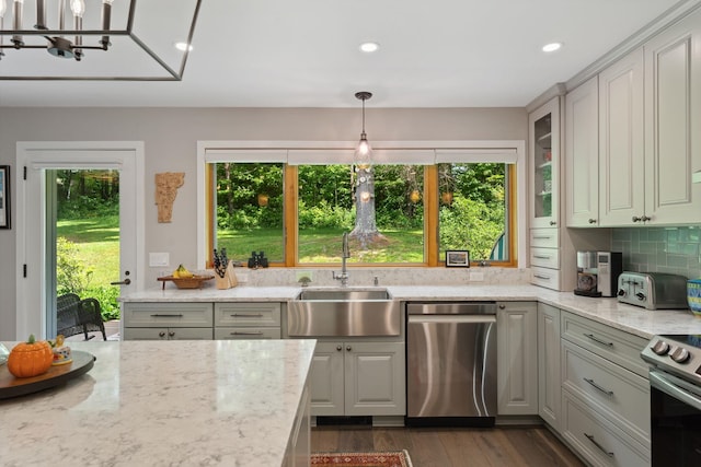 149 Club Sugarbush N Rd, Warren, VT 05674 - kitchen featuring stainless steel appliances, decorative backsplash, light stone counters, dark wood-style floors, and recessed lighting