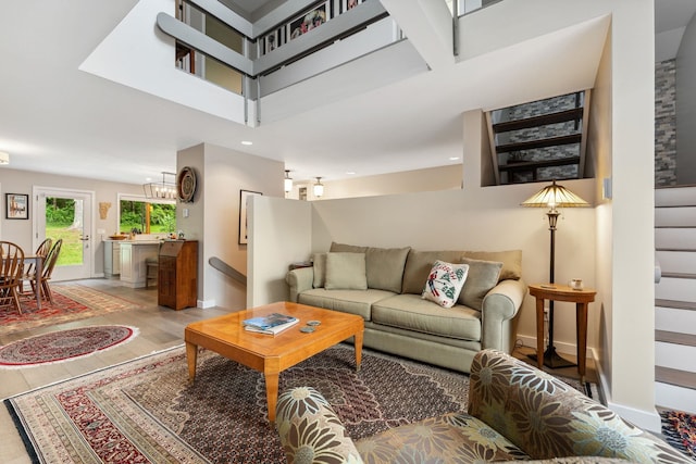 149 Club Sugarbush N Rd, Warren, VT 05674 - living area featuring a chandelier, light wood-style flooring, stairway, and recessed lighting