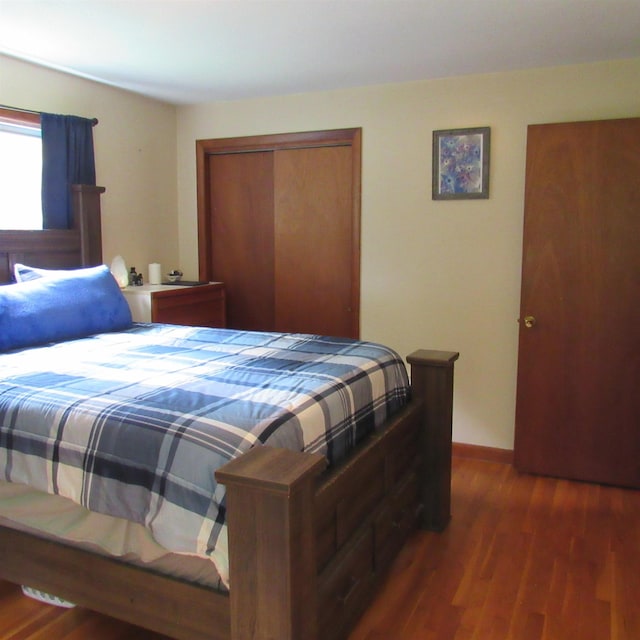 129 Chestnut St, Claremont, NH 03743 - bedroom featuring a closet and wood finished floors
