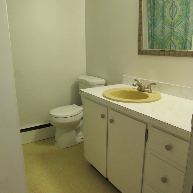 129 Chestnut St, Claremont, NH 03743 - bathroom featuring vanity and toilet