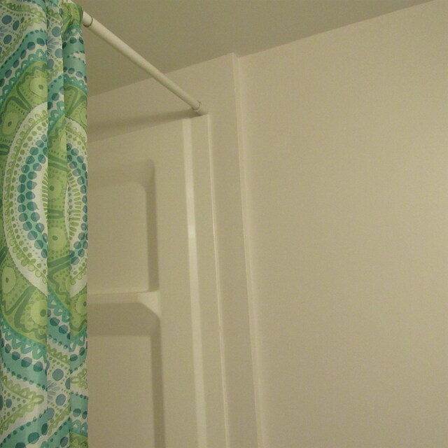 129 Chestnut St, Claremont, NH 03743 - full bathroom with a shower with shower curtain
