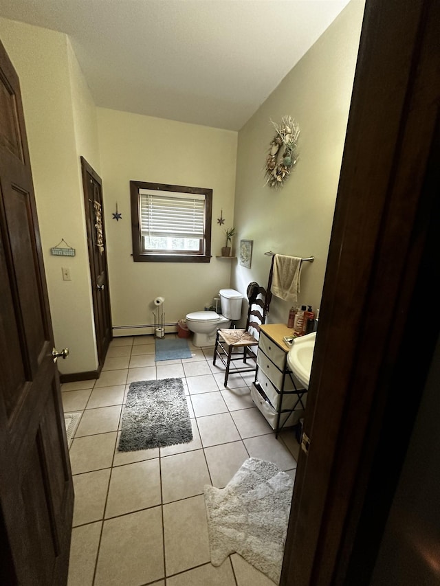 74 Dutton District Rd, Springfield, VT 05156 - bathroom featuring tile patterned floors, baseboard heating, and vanity