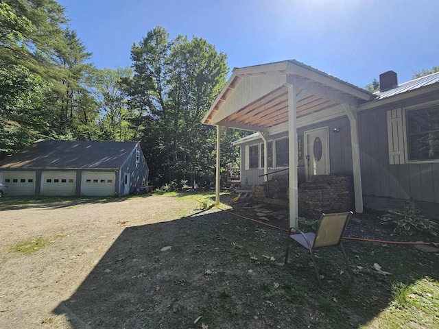 74 Dutton District Rd, Springfield, VT 05156 - view of yard with a detached garage and an outdoor structure