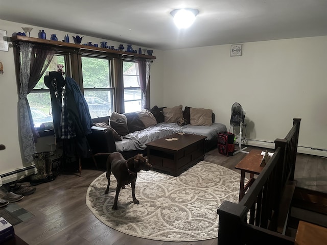 74 Dutton District Rd, Springfield, VT 05156 - living room featuring wood finished floors, plenty of natural light, and baseboard heating