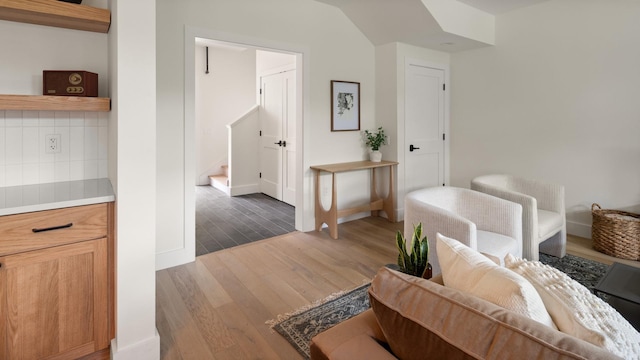 3148 Mountain Rd Unit B, Stowe, VT 05672 - corridor featuring light wood-style flooring and stairs