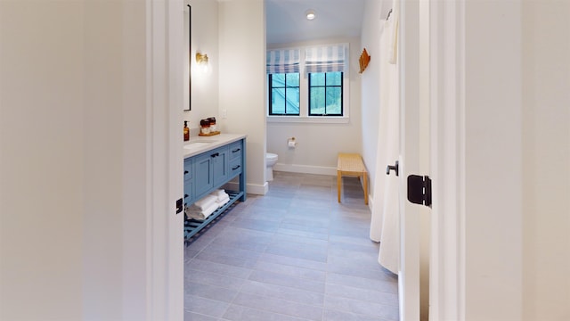3148 Mountain Rd Unit B, Stowe, VT 05672 - bathroom featuring vanity and tile patterned floors