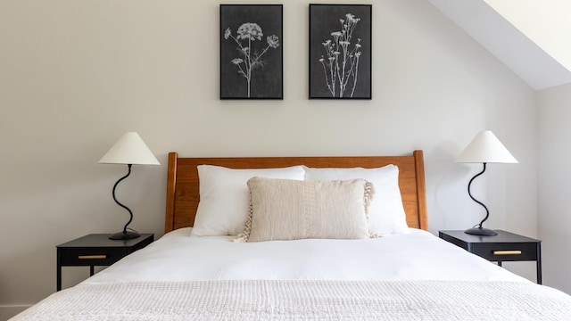 3148 Mountain Rd Unit B, Stowe, VT 05672 - bedroom featuring lofted ceiling