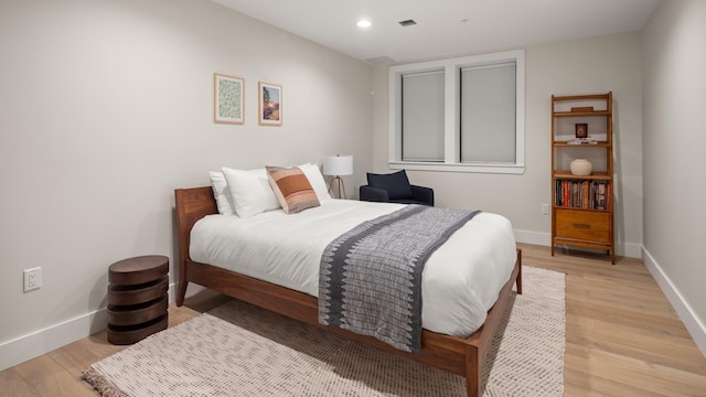 3148 Mountain Rd Unit B, Stowe, VT 05672 - bedroom featuring light wood-type flooring and recessed lighting