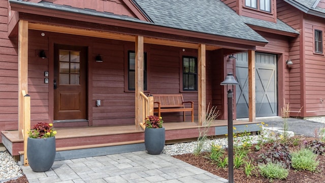 3148 Mountain Rd Unit B, Stowe, VT 05672 - property entrance with a shingled roof and a porch