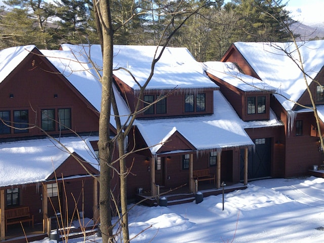 3148 Mountain Rd Unit B, Stowe, VT 05672 - chalet / cabin featuring covered porch