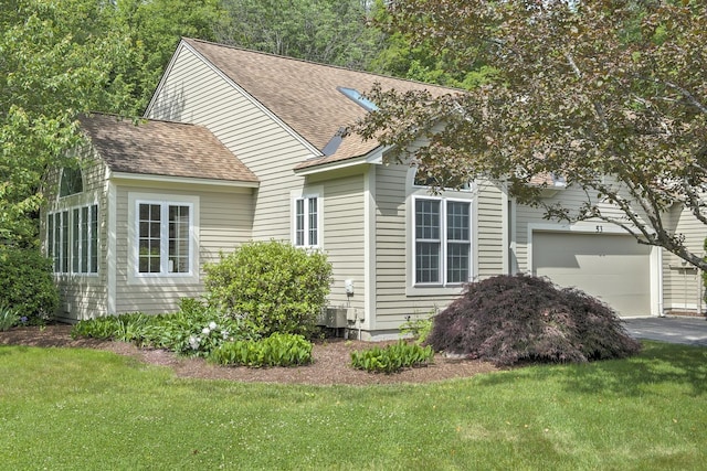 53 Summit Ridge Dr, Keene, NH 03431 - view of front facade featuring a shingled roof, an attached garage, and a front yard