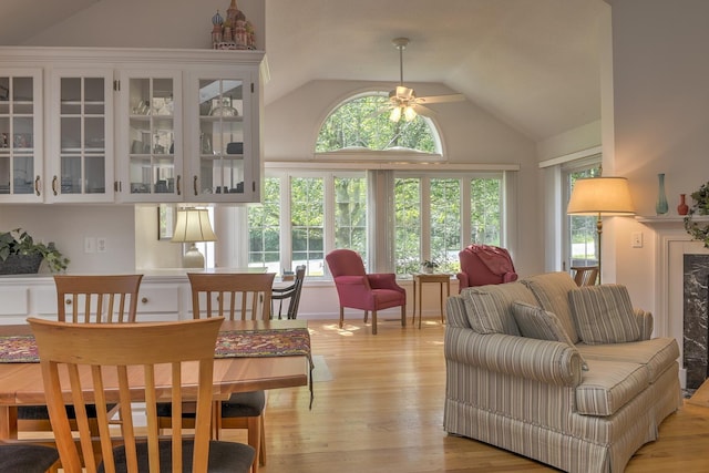 53 Summit Ridge Dr, Keene, NH 03431 - living area with vaulted ceiling, a ceiling fan, plenty of natural light, and light wood-style flooring