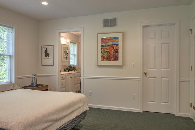 53 Summit Ridge Dr, Keene, NH 03431 - bedroom featuring dark carpet, ensuite bath, and recessed lighting