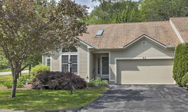 53 Summit Ridge Dr, Keene, NH 03431 - view of front of house featuring a garage, asphalt driveway, roof with shingles, and a front lawn