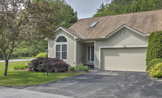 53 Summit Ridge Dr, Keene, NH 03431 - ranch-style house with a shingled roof, driveway, an attached garage, and a front lawn