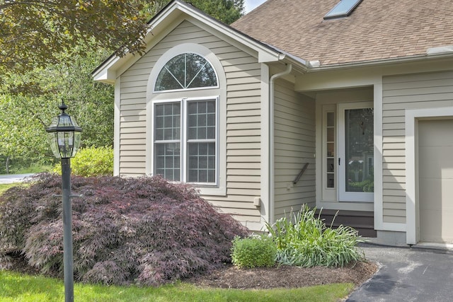 53 Summit Ridge Dr, Keene, NH 03431 - entrance to property featuring a shingled roof and a garage