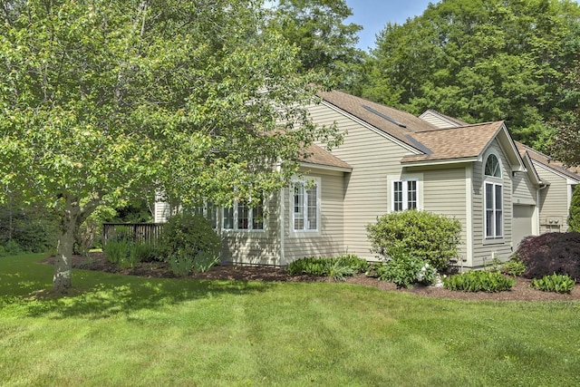 53 Summit Ridge Dr, Keene, NH 03431 - view of home's exterior featuring roof with shingles and a lawn