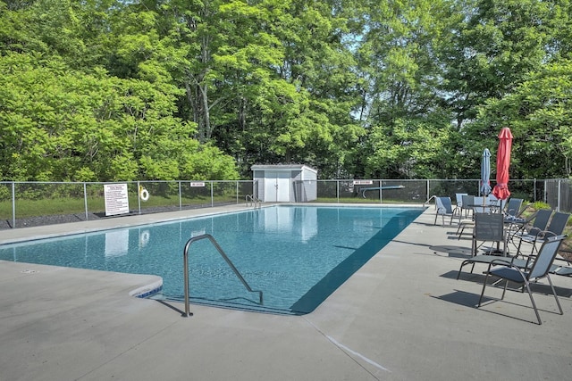 53 Summit Ridge Dr, Keene, NH 03431 - community pool with a patio area and a storage shed