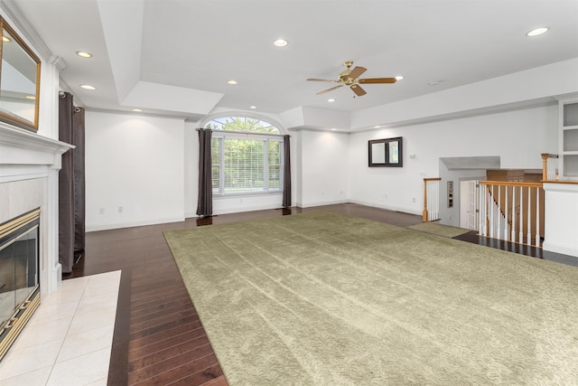 8 Aulson Rd, Salem, NH 03079 - unfurnished living room featuring light wood-type flooring, a ceiling fan, recessed lighting, and a tiled fireplace