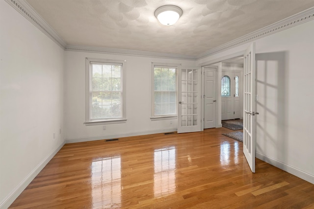 8 Aulson Rd, Salem, NH 03079 - empty room with french doors, light wood-style flooring, and crown molding