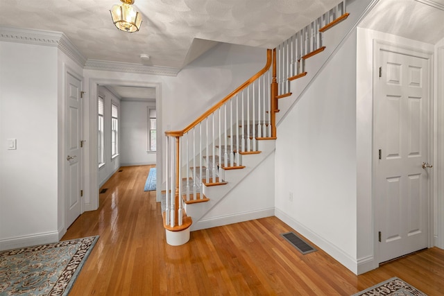 8 Aulson Rd, Salem, NH 03079 - entryway featuring wood finished floors and stairs