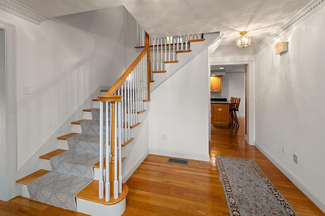8 Aulson Rd, Salem, NH 03079 - stairway featuring wood finished floors and baseboards