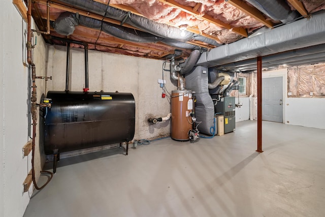 8 Aulson Rd, Salem, NH 03079 - unfinished basement featuring oil tank, water heater, and heating unit