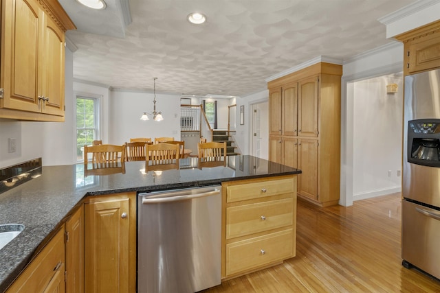 8 Aulson Rd, Salem, NH 03079 - kitchen featuring stainless steel appliances, a peninsula, a chandelier, light wood-style flooring, and dark stone countertops
