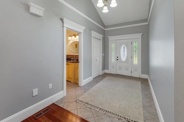 85 Blueberry Hill Rd, Meredith, NH 03253 - foyer featuring light tile patterned flooring and lofted ceiling