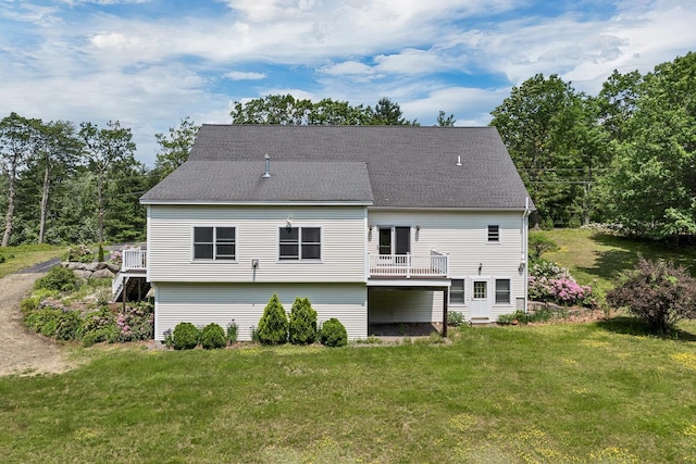 85 Blueberry Hill Rd, Meredith, NH 03253 - rear view of property with a yard and a shingled roof