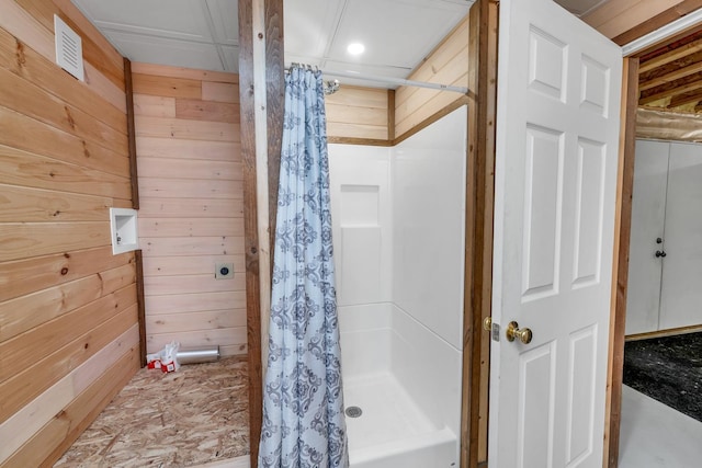 85 Blueberry Hill Rd, Meredith, NH 03253 - full bathroom featuring curtained shower and wooden walls