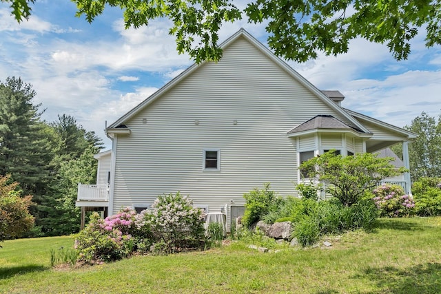 85 Blueberry Hill Rd, Meredith, NH 03253 - view of side of home with a lawn