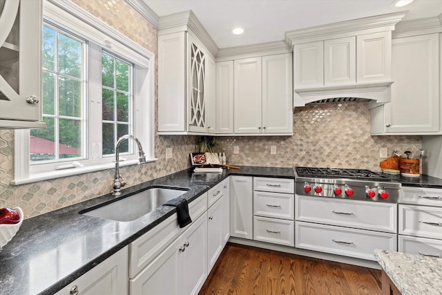 104 Windsor Dr, Auburn, NH 03032 - kitchen with stainless steel gas cooktop, dark wood-style floors, white cabinetry, glass insert cabinets, and backsplash