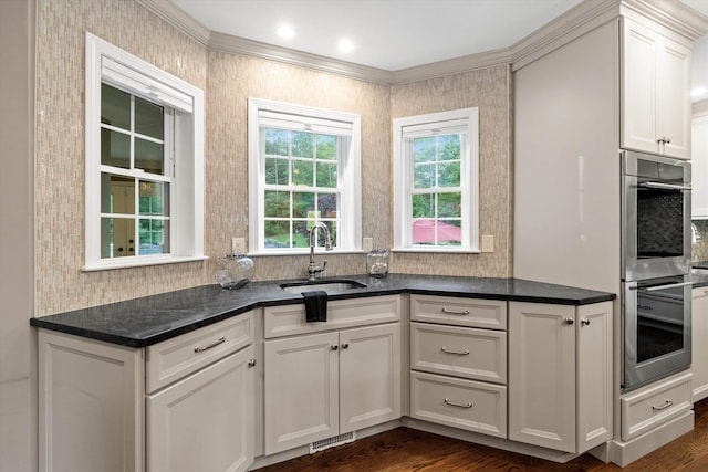 104 Windsor Dr, Auburn, NH 03032 - kitchen featuring double oven, white cabinetry, dark wood-style flooring, tasteful backsplash, and dark stone countertops