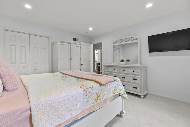 104 Windsor Dr, Auburn, NH 03032 - bedroom featuring light carpet, recessed lighting, and two closets