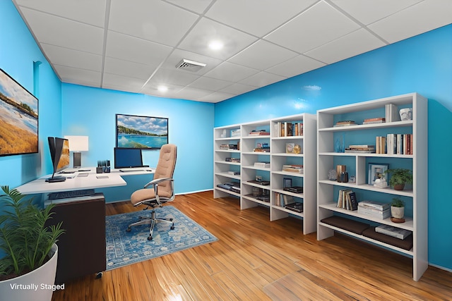 104 Windsor Dr, Auburn, NH 03032 - office space with wood finished floors and a paneled ceiling